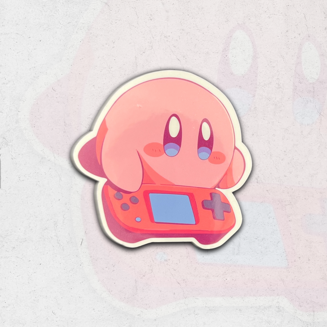 Kirby playing games - glossy vinyl sticker