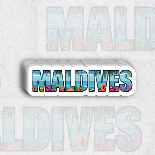 Stack of colorful 'Maldives' themed cards on a light gray background